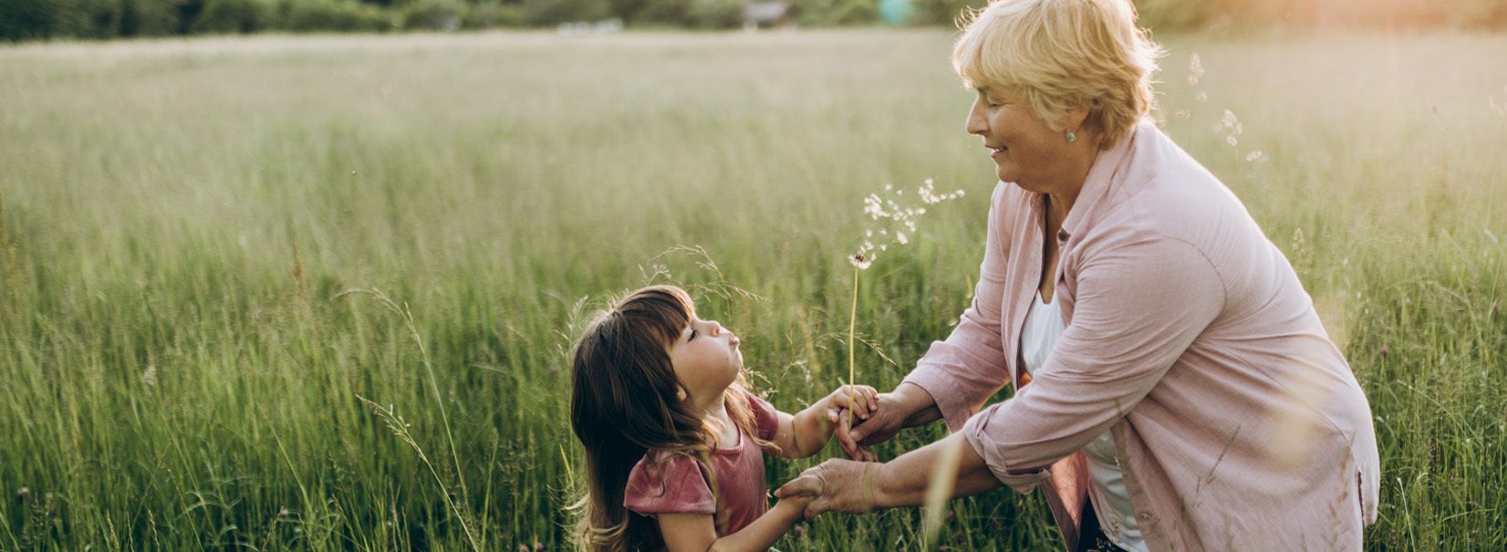 woman with grandchild field