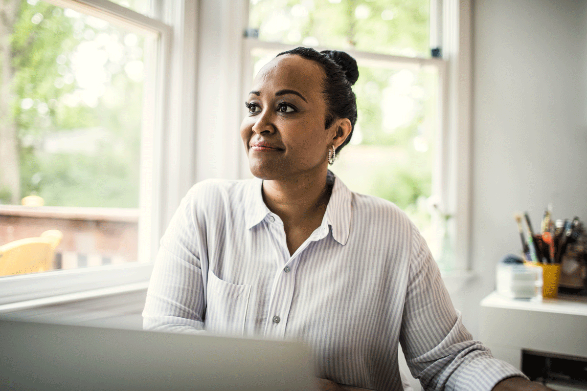 Women in her office smiling