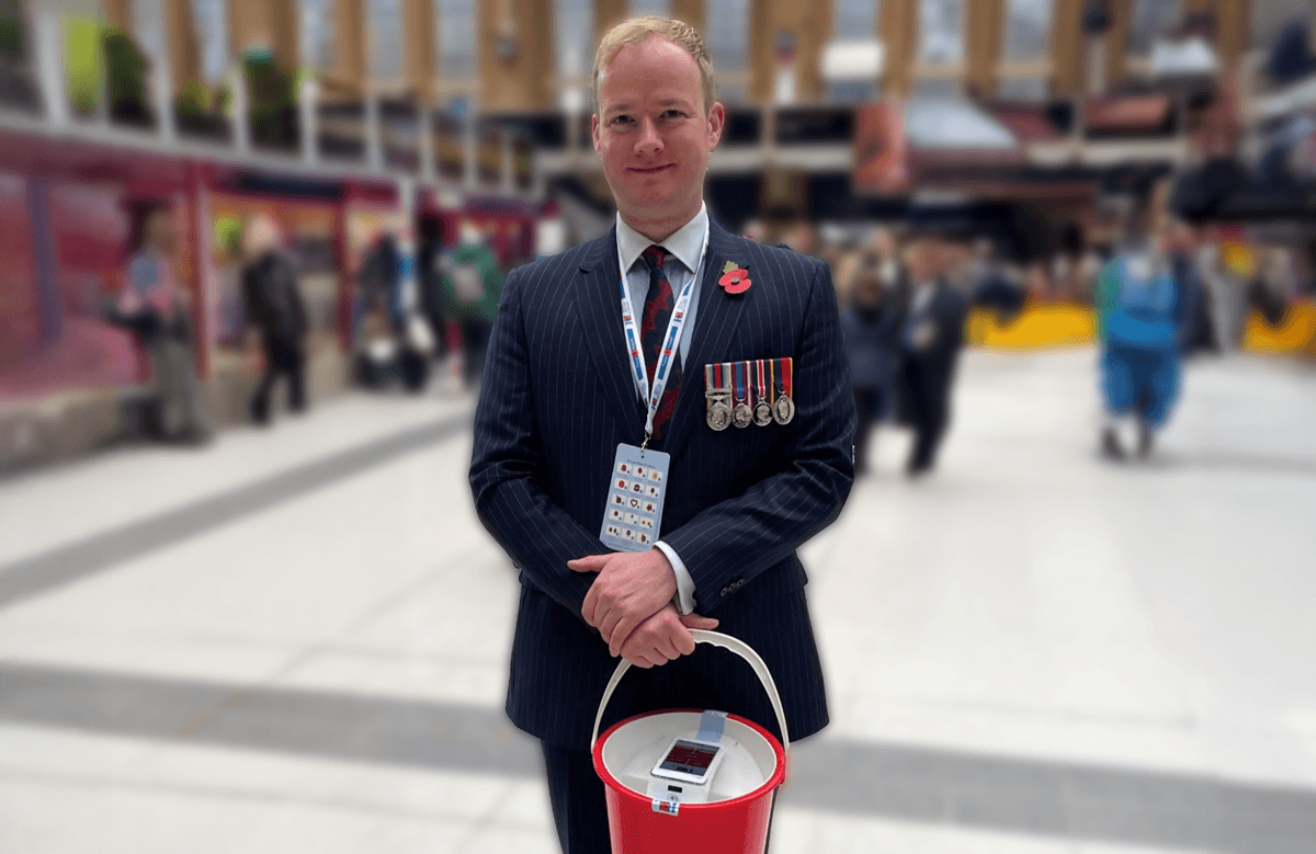 Image of Jack Barker selling poppies