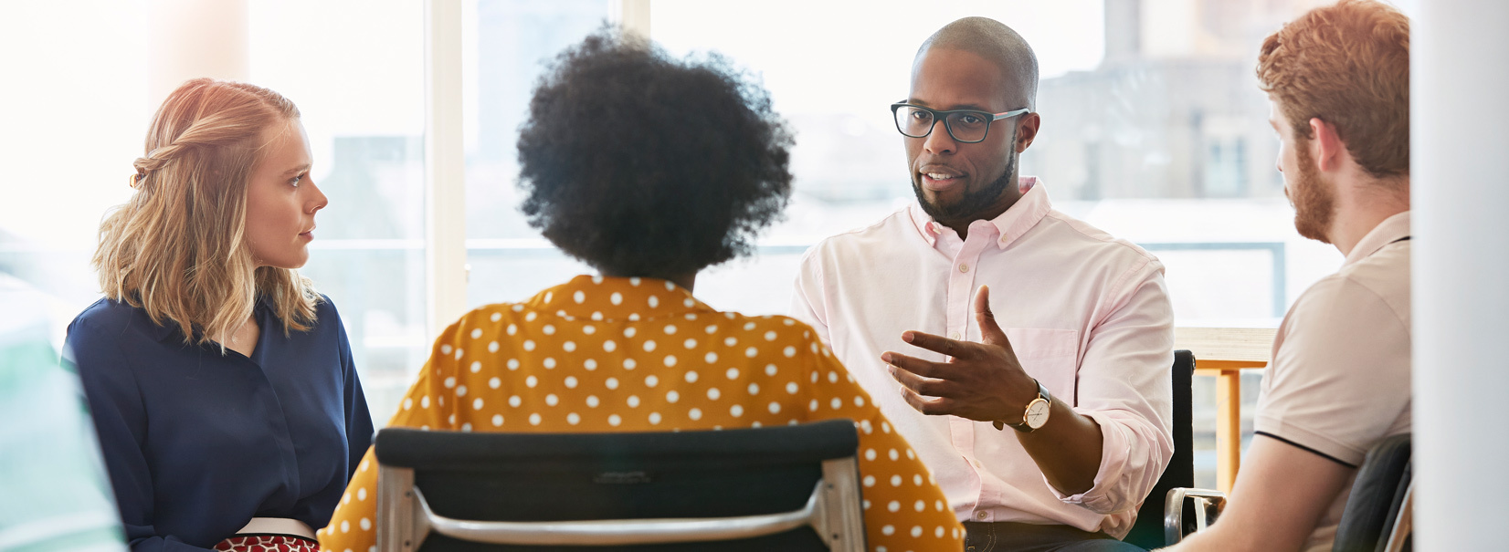 Team chatting in the office