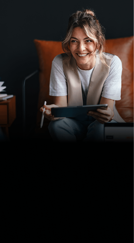 Woman holding a tablet talking to a client