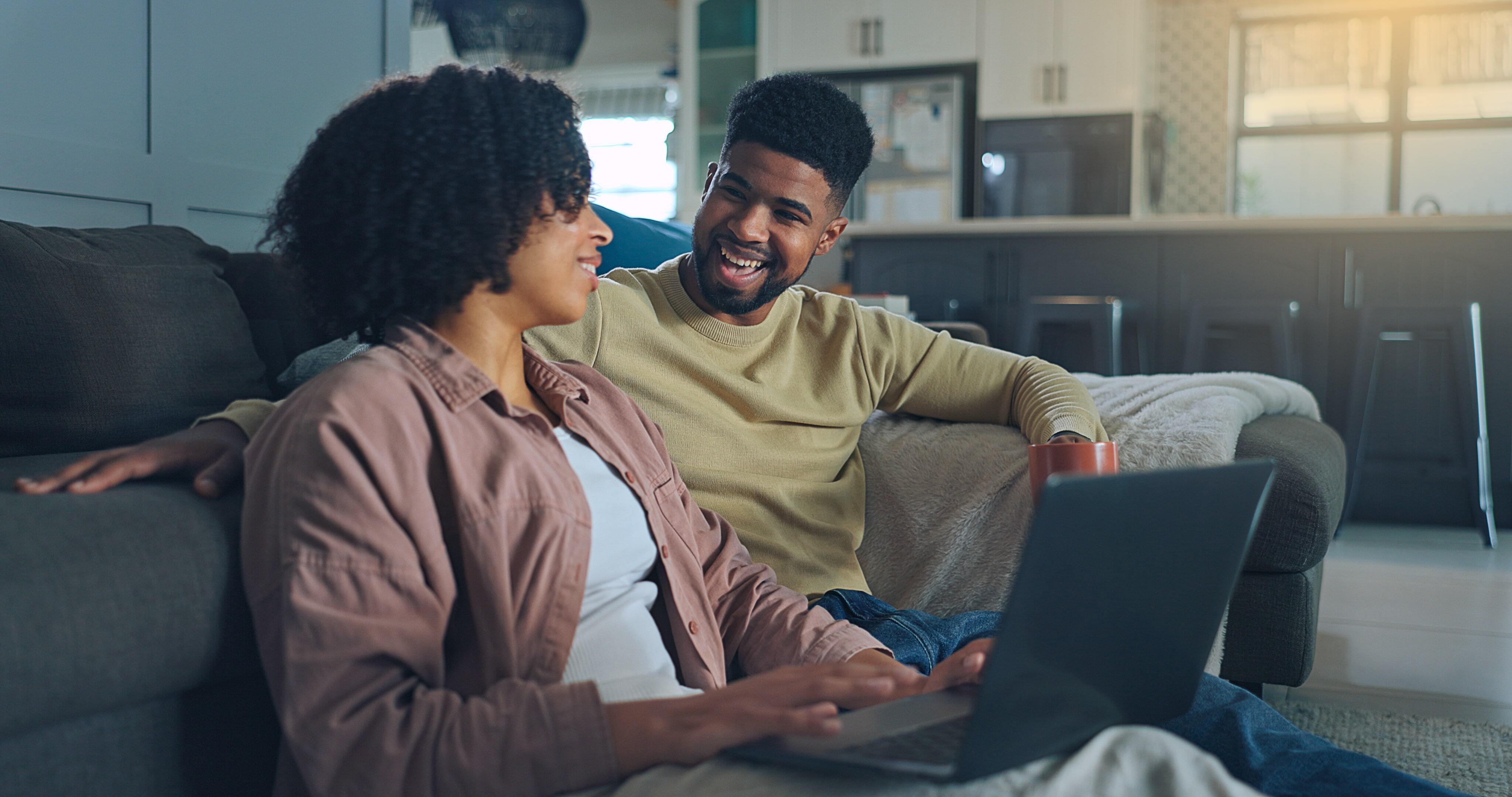 Young couple in the living room chatting