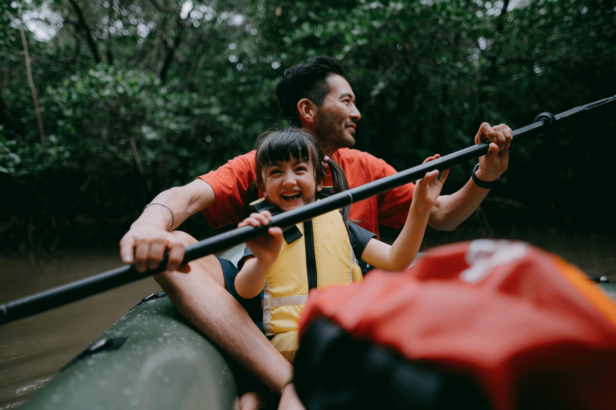Father and daughter canoeing